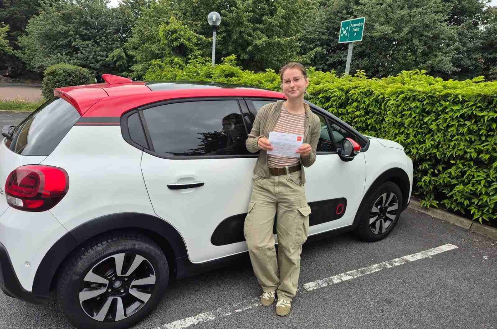 Instructor discussing the cost of automatic driving lessons and EDT packages in Tallaght.